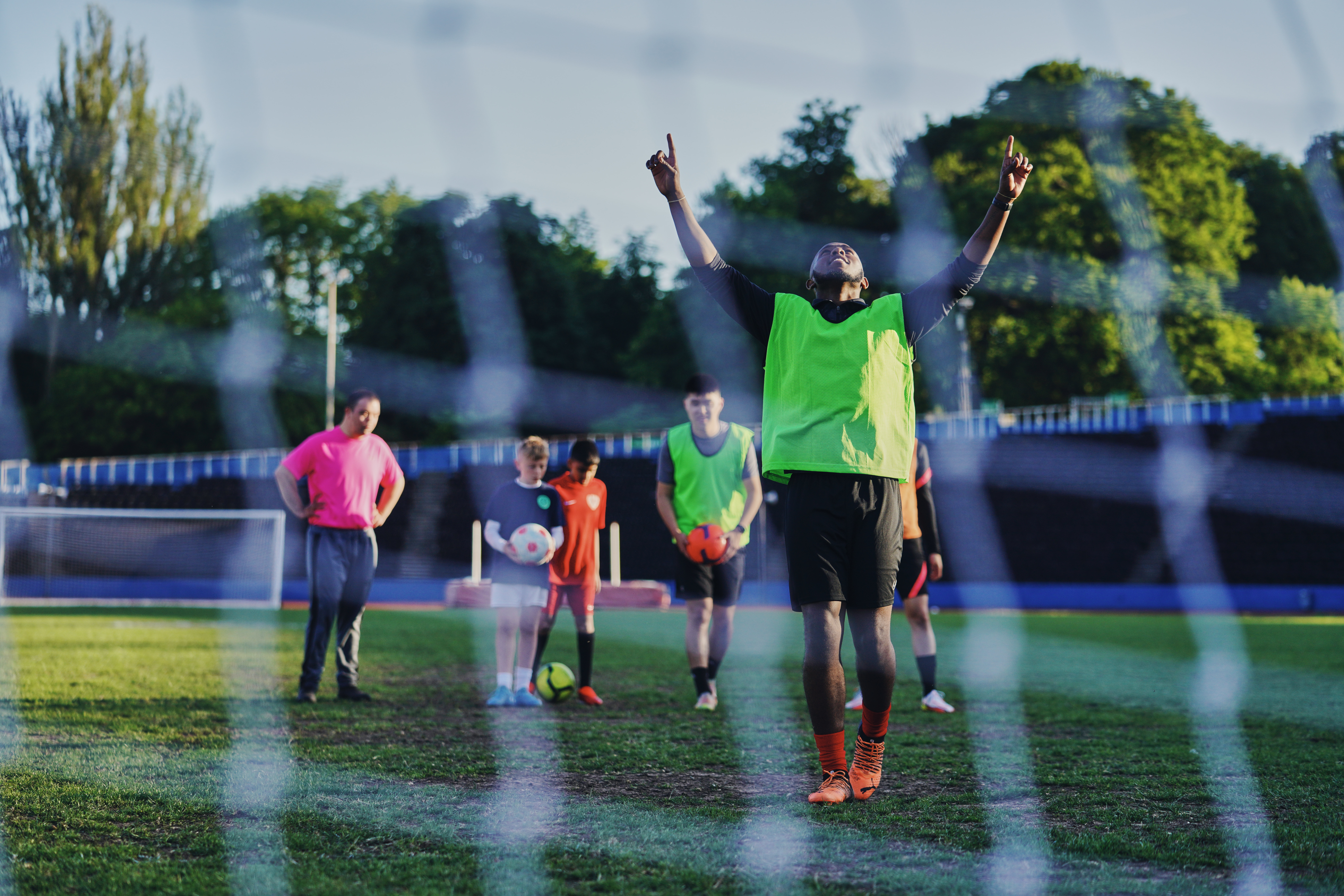 player celebrating with hands in air