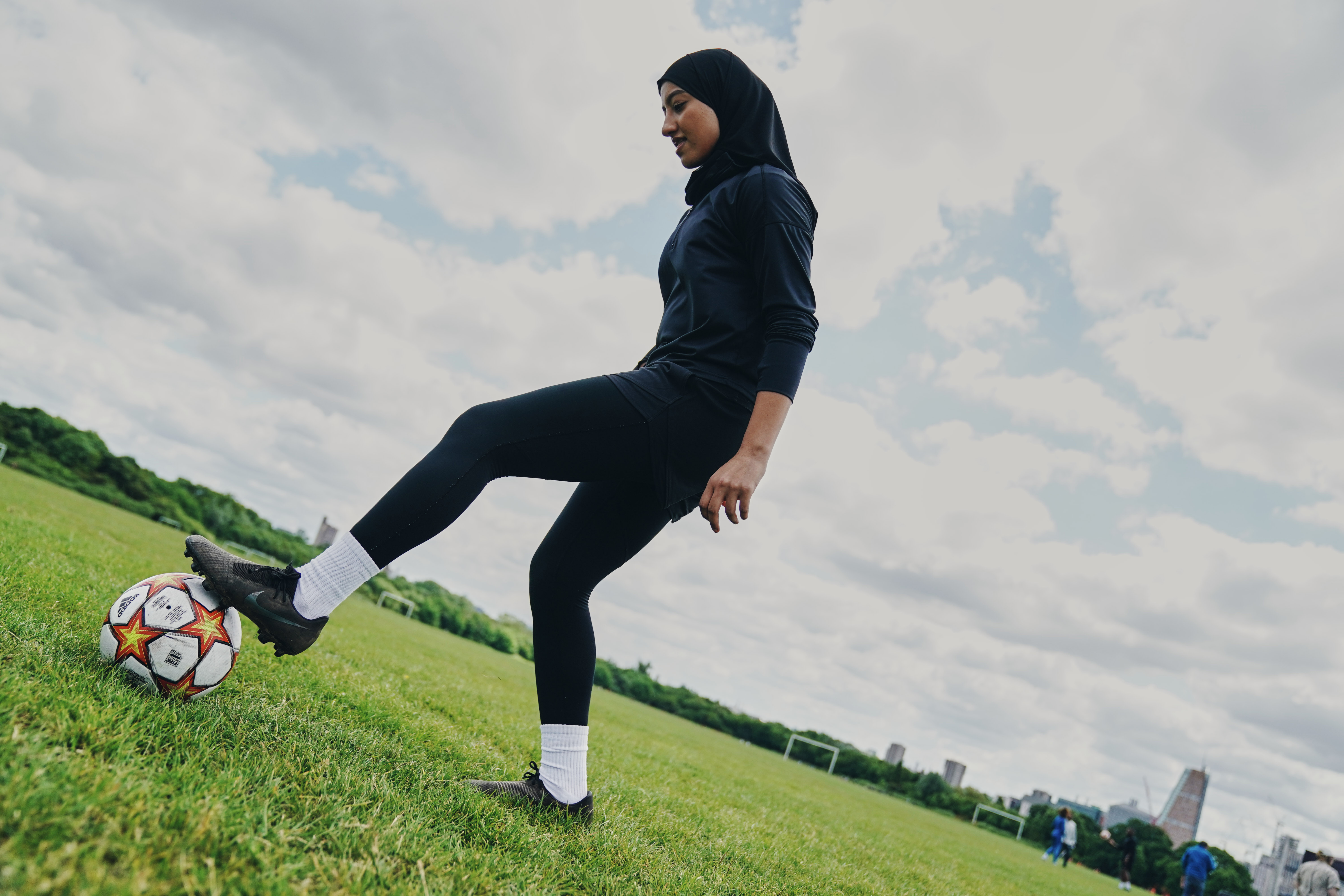 woman playing football